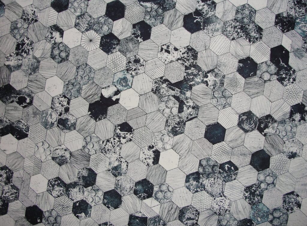 Abstract black and white hexagonal pattern with textured and geometric designs, ideal for backgrounds.